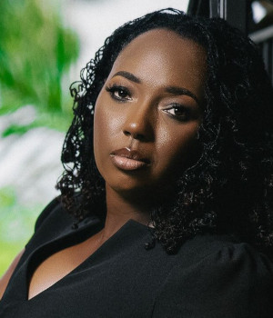 Ms. Simone E. Martin
